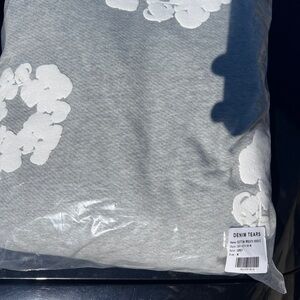 Denim Tears Gray Sweatshirt with White Floral Design